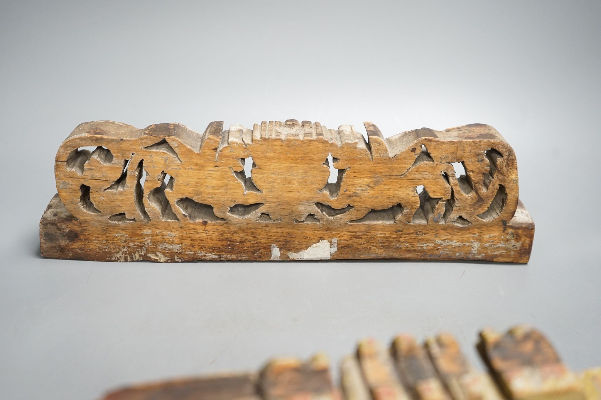 Two 19th century Sicilian wooden carvings, 40.5cm
